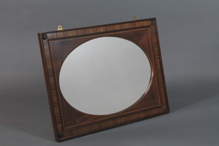 A late 19th Century rectangular wall mirror, boxwood and ebony inlaid, inset oval plate with rosette spandrels 23"h x 30.5"