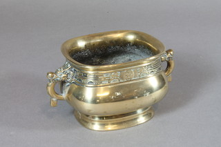 A Chinese bronze boat shaped twin handled sensor with dragon handles, seal mark to base 3"  ILLUSTRATED