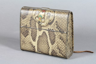 A Huntley & Palmer biscuit tin in the form of a snake skin hand bag 5.5"