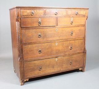 A George III oak and walnut chest, the upper section fitted 3  short drawers above 2 short and 3 long drawers with ivory  escutcheons and brass plate drop handles 45"h x 48"w x 22"d