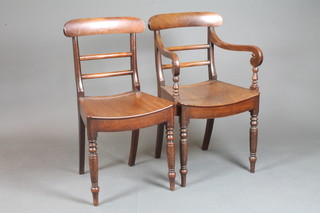 A set of 6 Georgian mahogany bar back dining chairs, 1 having arms, with shaped mid rails, solid seat, raised on turned  supports, 1 bar back f and r,