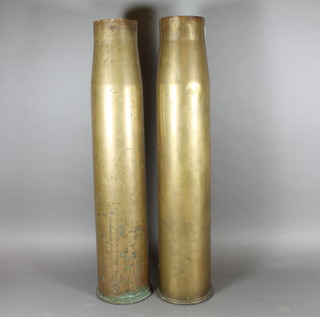 2 large brass shell cases 22.5"