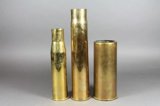 A brass Continental shell case 7", 2 anti aircraft shells 1 marked 1938 11" and a 37mm shell case