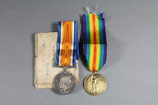 A pair British War medal and Victory medal to 901128 Driver J  Booker Royal Artillery, with original paper case of issue