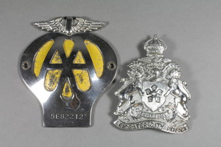 A George VI Leicester City Police helmet plate and an AA  beehive radiator badge marked 5E82212