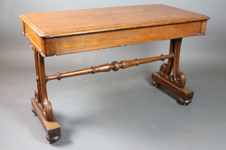 A Victorian rectangular oak library table raised on scroll supports  29"h x 48"w x 24"d