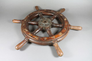 A wooden and metal 6 spoked ships wheel 22"