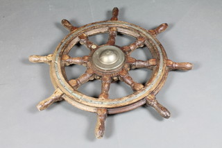 A wooden and metal 8 spoked ships wheel 34"