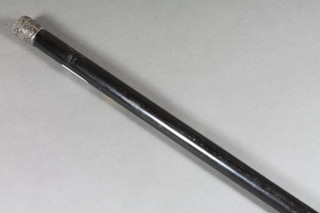 An ebony evening cane with silver mount