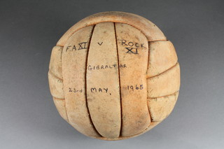 A Bobby Moore leather football, marked FA X1 The Rock  Gibraltar 23rd May 1965