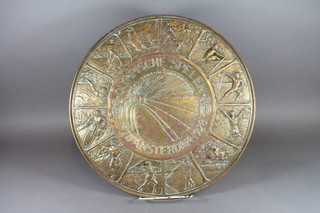 A circular embossed brass charger to commemorate the 1928 Amsterdam Olympics 20"  ILLUSTRATED