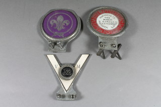 A Magic Circle of London radiator badge, a Scouts radiator  badge and a Veteran Motorist do.
