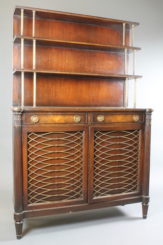A Regency style mahogany chiffonier, having a 3 shelf back with  brass column supports above 2 frieze drawers and 2 cupboard  doors with brass trellis panels, flanked by reeded pilasters  fashioned as quivers on turned, tapered reeded legs 68"h x 46"w  x 17"d