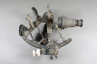 A bronzed sextant, grip marked HRS no.6366