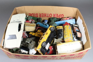A quantity of Dinky and Corgi toy cars, all play worn