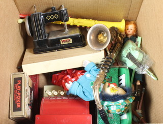 A St Michael's pre-decimal pressed metal till together with a  childs accordion, a Vulcan sewing machine and other toys