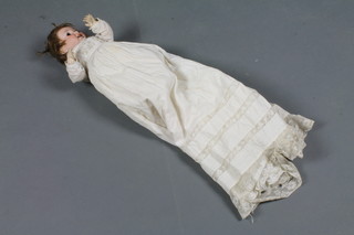 An early 20th Century Armand Marseille bisque head doll with go to sleep eyes, open mouth and fixed limbs, af,