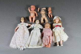 A collection of miniature dolls