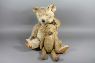 An early 20th Century mohair teddy with articulated limbs 13.5"h and 1 other mohair teddy 20"h