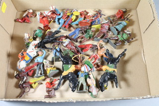 A collection of lead and die cast figures of North American  Indian warriors, various makes
