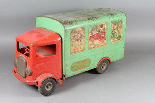 A Lines Bros. Ltd. tin plate cargo lorry with green and red  livery, decorated advertising transfers for Triang toys, 18"l