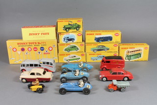 A collection of Dinky and Lesney model cars including a Dinky  Royal Mail van No.260, a Corgi red Riley Pathfinder, a Dinky  grey Observation Coach, a Dinky caravan No.190, a Dinky Talbot Lago No.23K, a Crescent Cooper Bristol Grand Prix car, a Crescent Gordini Grand Prix car, a Dinky Vauxhall Cresta No.164 in cream and maroon, a Dinky red double deck bus advertising Dunlop No.290 - boxed, a Dinky Studebaker President No.179 with yellow and blue coach work - boxed, a Dinky Universal jeep with red coach work No.405 - boxed, a Dinky Volkswagen beetle No.181 - boxed, a Dinky Plymouth Plaza with windows No.178 - boxed, a Dinky Morris commercial van - Capstan advertising van No.465 - boxed, a Dinky Ford Zephyr saloon No.162 - boxed, a Dinky Humber Hawk with windows No.165 and a Dinky B.O.A.C. coach No.283 - boxed, a Dinky Toys No.771 International road sign set - boxed, together with a Meccano AA motorcycle and side car and a Lesney dumper trunk  ILLUSTRATED
