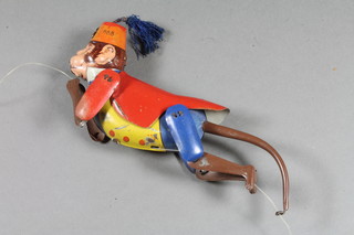 A Lehmann tin plate climbing "Tom" monkey with orange fezz,  red overcoat with yellow waistcoat 6.25"h