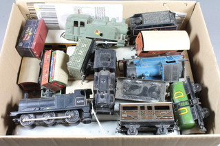 A collection of Hornby and other "OO" gauge locomotives,  carriages, trucks and tenders