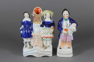 A Staffordshire figure of a gentleman with jug and glass 9" and a Staffordshire flat back figure group of ladies by a well head 6"