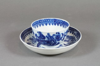 A Dr Wall period blue and white tea bowl and saucer, the base  with crescent mark, some chips to base