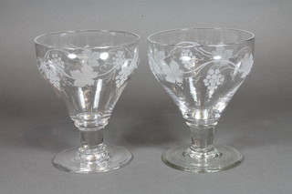 A pair of etched glass rummers