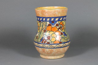 A Charlotte Rhead Crown Ducal circular vase with floral  decoration, base signed Charlotte Rhead 7"