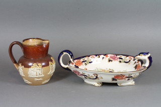 A Masons Mandalay pattern twin handled oval dish, with brown Masons mark 7" and a Doulton Lambeth stone glazed jug 5"