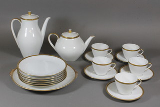 Feltmann Weiden, a Bavarian hard paste porcelain 19 piece tea/coffee service with geometric gilt decoration comprising side  plates, cake plate, teapot etc