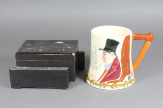 A musical pottery jug playing John Peel and a Japanese lacquered musical jewellery box