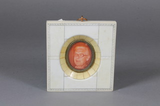 A 20th Century miniature photographic portrait of a lady  contained an ivory frame 4.5" x 4"