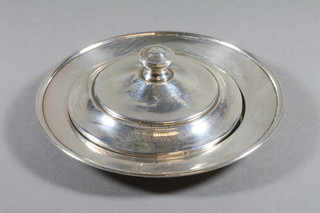 A circular silver butter dish base and lid, London 1927 3 ozs