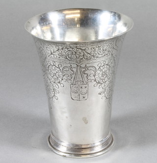 A Continental engraved silver beaker of waisted form, base  marked IM, 3 ozs  ILLUSTRATED
