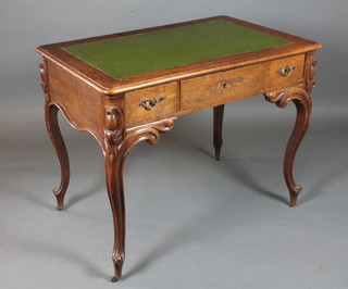 A 19th Century Continental oak writing table, inset green leather  skiver, above 1 long and 2 short drawers, raised on shaped  cabriole supports 31"h x 39"w x 25"d