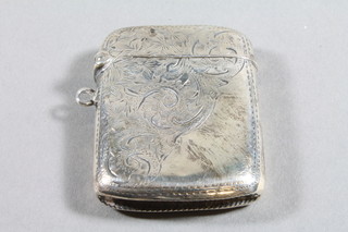 An Edwardian engraved silver vesta case, Birmingham 1902