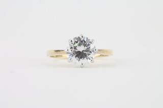 A 9ct gold dress ring set a solitaire cubic zirconia