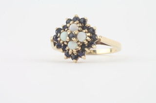 A 9ct gold cluster dress ring set opals and sapphires