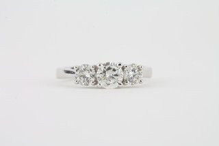 An 18ct white gold dress ring set 3 diamonds approx 1.18 ct