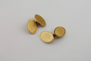 A pair of 9ct oval cufflinks with engine turned decoration 11.4grams