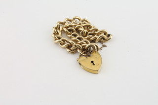 A 9ct gold curb link bracelet with padlock clasp 