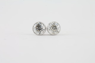 A pair of 18ct white gold ear studs set diamonds approx 2ct