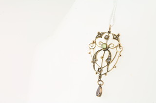 A 9ct yellow gold pendant set seed pearls and peridot