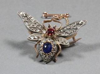 A belle epoque butterfly brooch, the body set sapphire, ruby and diamonds  ILLUSTRATED