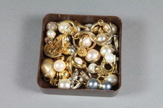 A quantity of various clip on earrings