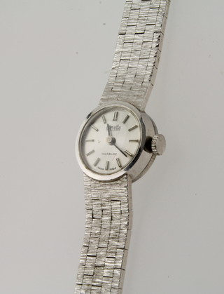 A lady's Corvette cocktail wristwatch contained in a white metal  case